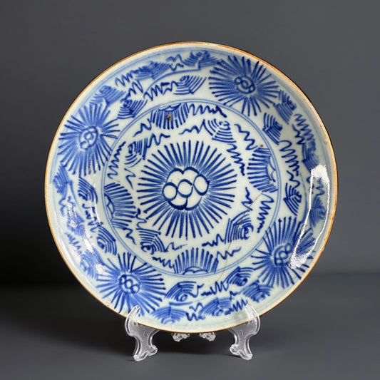 18th ct.  Blue and white Chinese porcelain plate with stylised floral design.